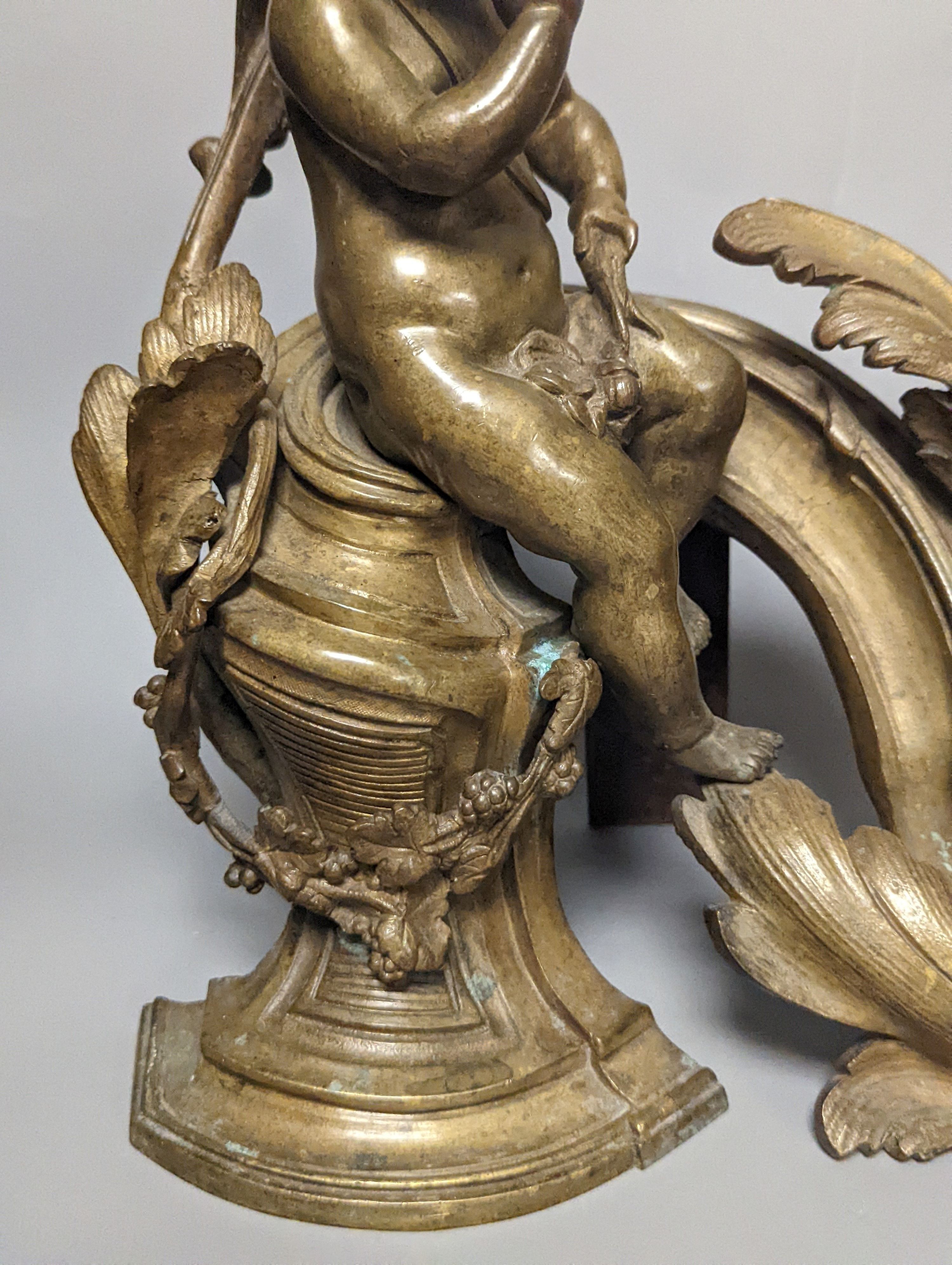 A pair of 19th century French bronze putti chenet 31cm